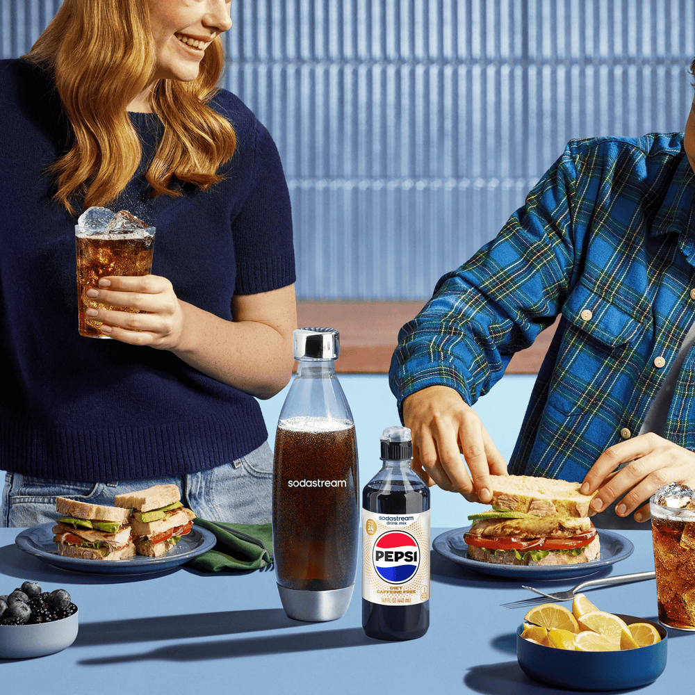 Friends enjoying Sodastream drinks, including the Sodastream Caffeine Free Diet Cola