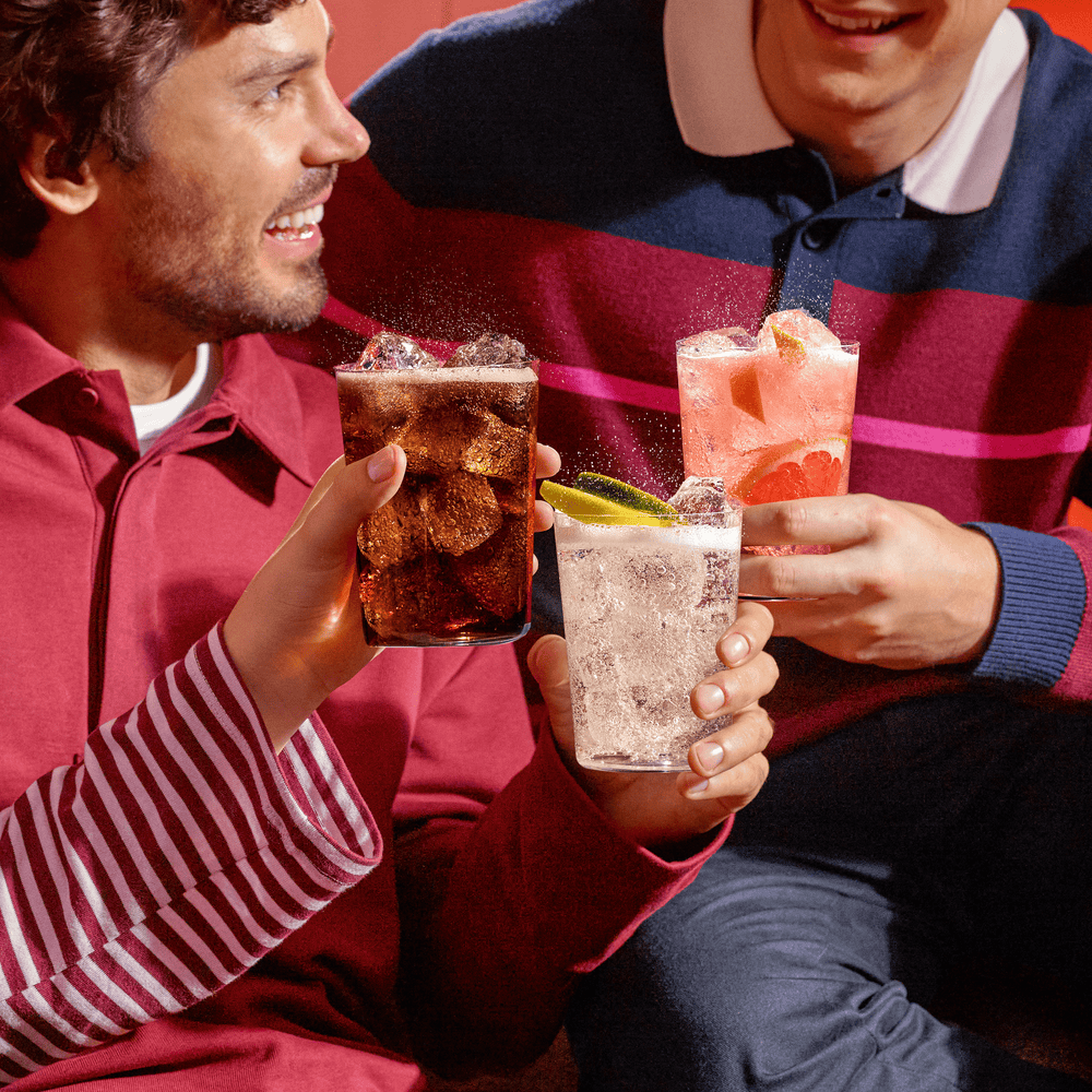 Friends enjoying Sodastream drinks, including the Sodastream Diet Tonic