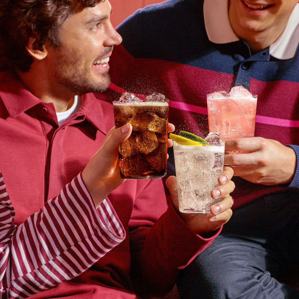 Friends enjoying Sodastream drinks, including the Sodastream Strawberry Watermelon Zero